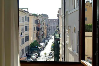 a view of a city street from a window at Restart Accommodations Rome in Rome