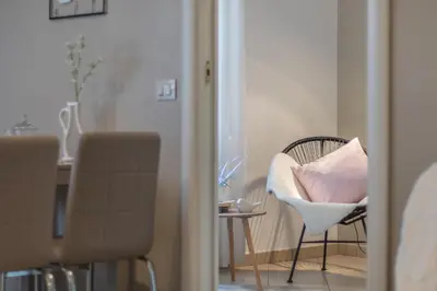 a room with a chair with a pillow on it at Vaticano San Pietro Apartment in Rome
