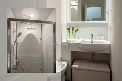 a bathroom with a shower and a sink and a toilet at SECRET GARDEN - Amazing Loft in The Imperial Rome in Rome