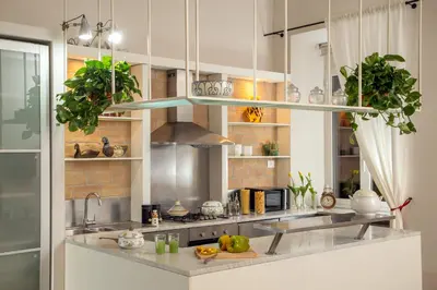 a kitchen with a counter with plants on it at SECRET GARDEN - Amazing Loft in The Imperial Rome in Rome