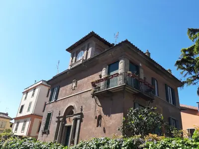 an old building with a balcony on top of it at OB1 Vacanze Romane in Rome