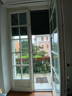 an open door with a view of a balcony at OB1 Vacanze Romane in Rome