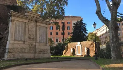a monument in a park in front of a building at Rome's Best Holidays Guest House in Rome