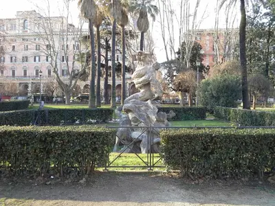 a statue in the middle of a park at Rome's Best Holidays Guest House in Rome