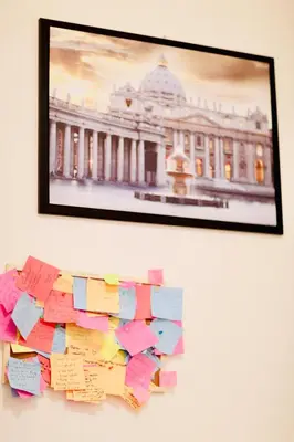 a picture of a building hanging on a wall at Amazing Vaticano in Rome