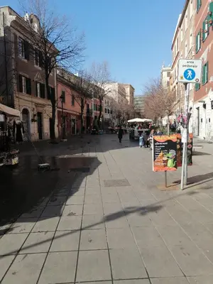an empty street in a city with buildings at B&B Pigneto7 in Rome