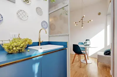 a kitchen with a blue counter and a sink at RENOVATED AND COZY FLAT in Rome