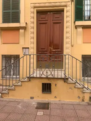 a hallway with a door leading to a bedroom at Roman Art Apartment - Metro C to Colosseum in Rome