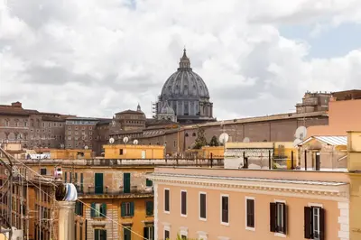 a view of the vatican from the roofs of buildings at Living by Vatican with panoramic terraces in Rome in Rome