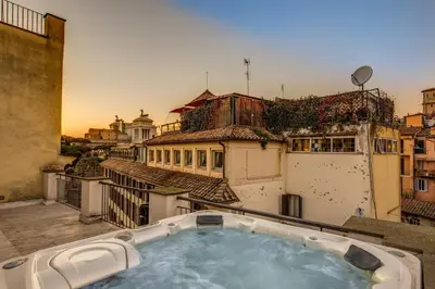a hot tub on the roof of a building at Argileto Terra in Rome