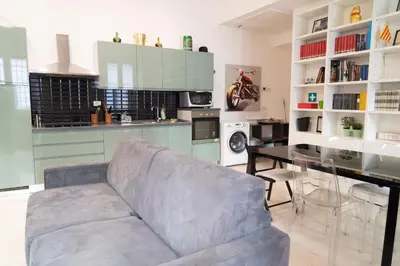 a living room with a couch and a table at SvHome in Rome