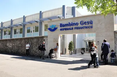 a group of people standing outside of a building at Basilica Papale di San Paolo Appartamento Moderno - YOURhOME in Rome