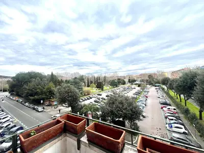 a view of a parking lot with cars parked at Casa Pinturicchio in Rome