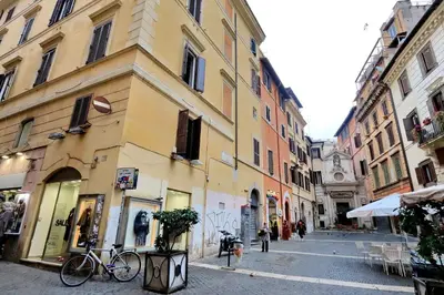 a city street with buildings and a bike parked on the street at Campo dei Fiori Giubbonari Amazing in Rome