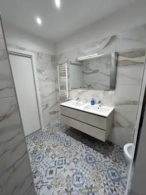 a bathroom with a sink and a mirror at San Peter Vale House in Rome