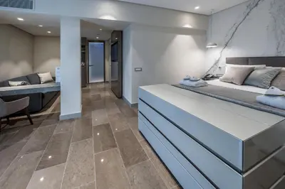 a bathroom with a sink and a mirror at The Regency, Rome, a Tribute Portfolio Hotel in Rome