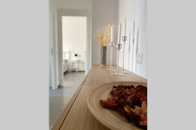 a plate of food on a table in a kitchen at Central modern apartment Rome -Locazione Turistica- in Rome