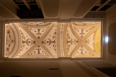 a window in a room with a decorative wall at Maalot Roma - Small Luxury Hotels of the World in Rome