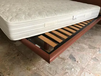 a bed with a mattress on top of it at Questa casa non è un albergo CIU-ATR 9390-9 in Rome