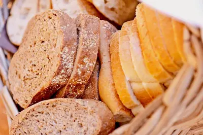 a basket filled with slices of bread with at Residenze Argileto in Rome