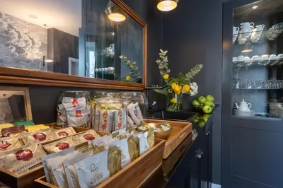 a display case in a store filled with food at Charme 308 in Rome