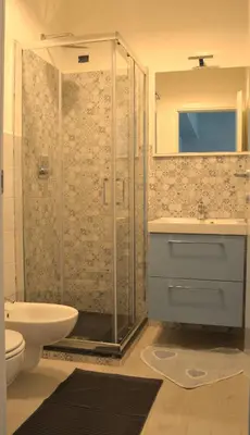 a bathroom with a shower and a toilet and a sink at Sophie's Choice 2 a San Pietro in Rome