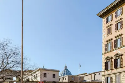 a large building in the middle of a city at My Home in San Pietro in Rome