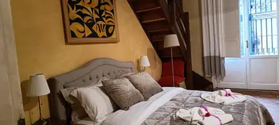 a bedroom with a bed with towels on it at Residenza al Pantheon - RH Collection in Rome