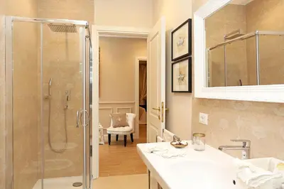 a bathroom with a shower and a sink at Daplace - Lucrezia Apartment in Rome
