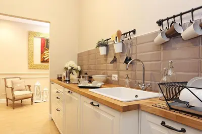 a kitchen with a sink and a counter at Daplace - Lucrezia Apartment in Rome