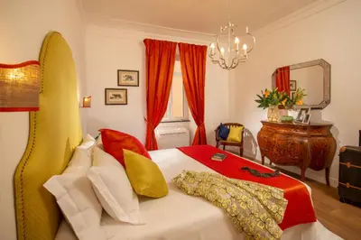 a bedroom with a bed with a surfboard on it at Daplace - Flaminia Apartment in Rome