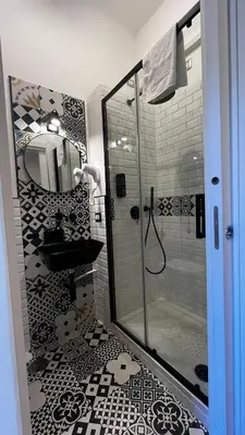 a bathroom with a shower and a sink and a mirror at Da Vinci in Rome