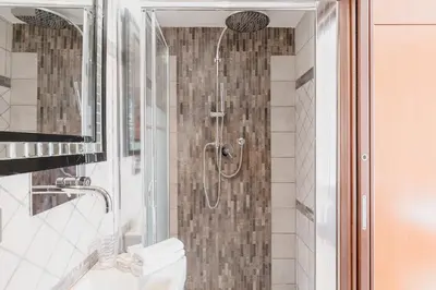 a bathroom with a shower and a toilet at Casa Flo in Rome