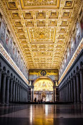 a large room with a gold ceiling and columns at Erossuite GuestHouse in Rome