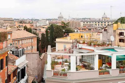 a view of a city from a building at Black Enchanting Jacuzzi Suite Trastevere in Rome