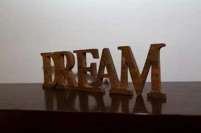 a wooden sign for the word yawn spelled out inieval at Rufina Apartment in Rome