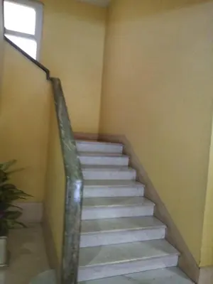 a staircase in a building with a window at B&B Affaccio sul Vaticano in Rome