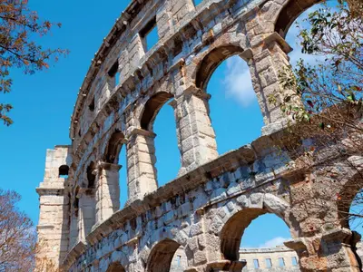 ancient ruins of a building with arches at Apartment Regina's House - St Peter by Interhome in Rome