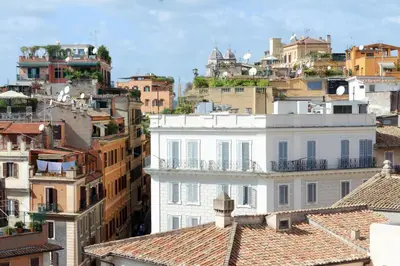 a view of a city with buildings and roofs at Crispi Luxury Apartments - My Extra Home in Rome