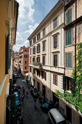 a view of a city street with cars and buildings at B&B La Scalinatella in Rome