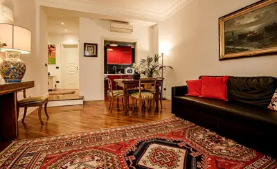 a living room with a couch and a table at Casa Riz in Rome