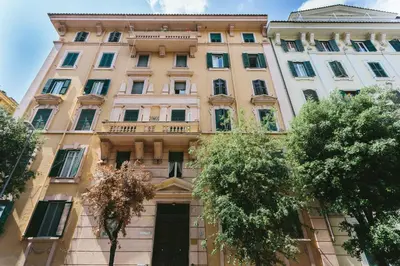 a tall building with a door in front of it at Next Stop St Peter Rome in Rome