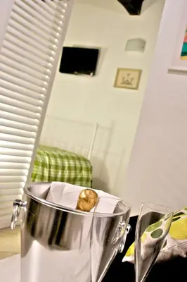 a bowl on a table with a piece of food in it at Nostromondo Apartments in Rome City Centre in Rome