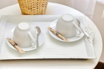 two cups and saucers on a tray on a table at Dream City Rome in Rome