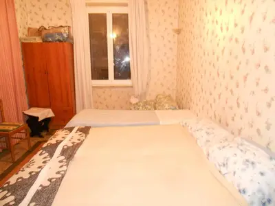 a bedroom with two beds and a window at Sidereus in Rome