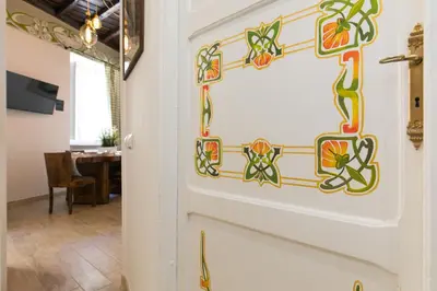 a door with a colorful design on it in a room at Navona Open Space Apartments in Rome