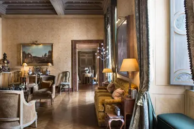 a living room with a couch and a table at Residenza Napoleone III in Rome