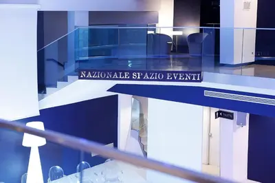 a glass table with a sign that reads koalaale st kilda event at Rome Life Hotel in Rome
