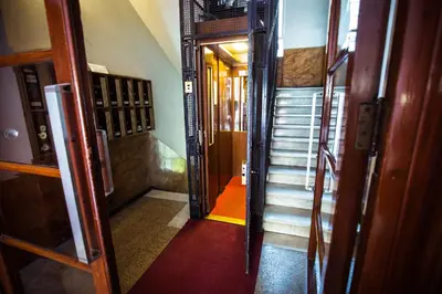 a hallway with stairs leading to a room at I Prati Di Roma in Rome