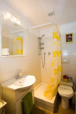a bathroom with a sink and a toilet and a shower at I Prati Di Roma in Rome